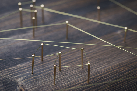 Web of wires, showing connections between groups and individualsの写真素材