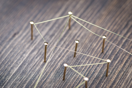 Web of wires, showing connections between groups and individualsの写真素材