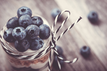 Parfait. Blueberries with greek yogurt and granolaの写真素材