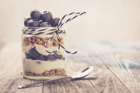 Parfait. Blueberries with greek yogurt and granolaの写真素材