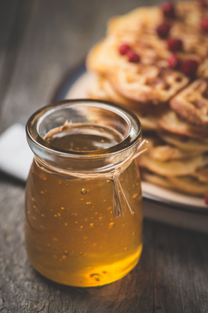 Dessert. Homemade sweet and tasty hot pancakes on a rustic tableの写真素材