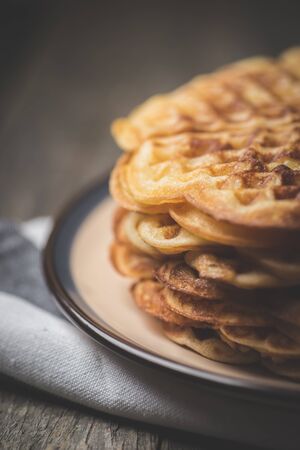 Dessert. Homemade sweet and tasty hot pancakes on a rustic table