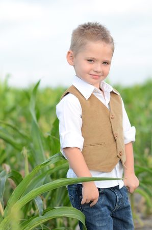 LITTLE BOY IN CORNFIELDの写真素材