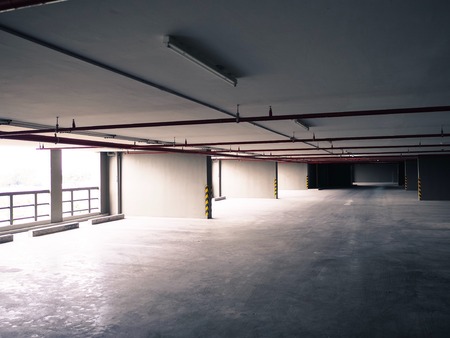 Empty cement parking garage interior in the condominiumのeditorial素材