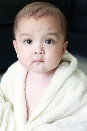 Baby in towelの写真素材