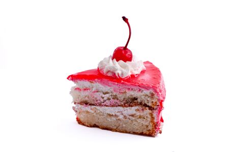 Isolated piece of cake with cherry and creamの写真素材
