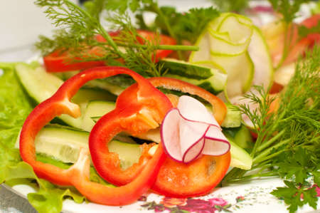 Tasty fresh crop vegetables with vitamins on the tableの写真素材