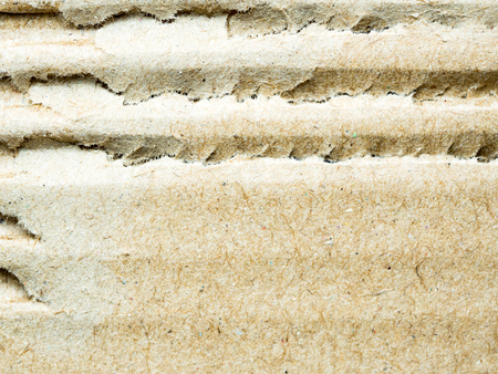 close up scratch  brown corrugated cardboard, abstract background and textureの写真素材