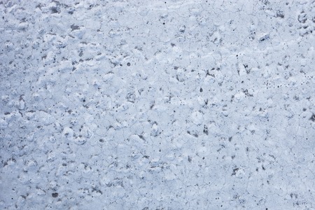 Grey concrete surface with rich and various texture  