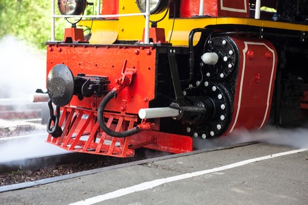 Steam locomotive blowing off the steam before moving
