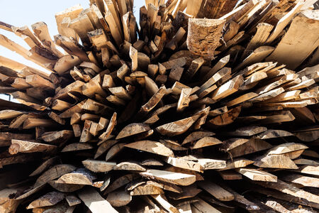 Pile of raw planks of pine wood の写真素材