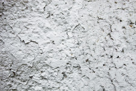 Whitewashed wall with rich and various texture.の写真素材