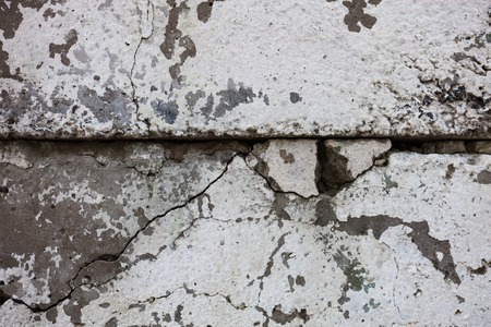 Cracked concrete blocks surface with rich texture.の写真素材