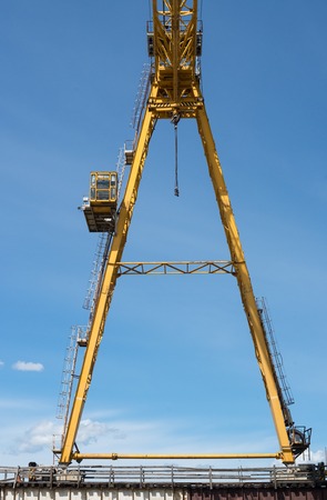 Gantry crane against the blue sky backgroundの写真素材