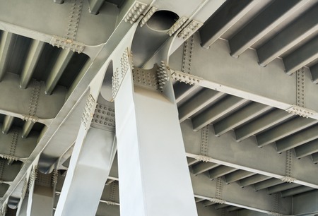 Gray metal framework of the bridge. Industrial surface. Close up.の写真素材