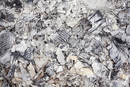 Pile of burnt corrugated paper. Close up.