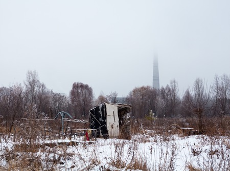 Temporary self-made shelter covered with the snow in winter.の写真素材