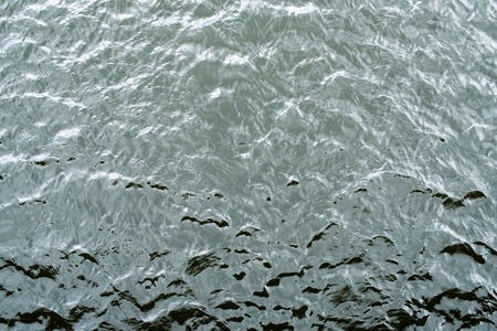 Cold and deep water surface with ripples.の写真素材