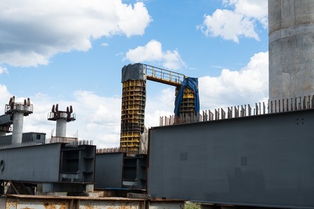 Bridge construction site with concrete piers already finished and still in the metal formwork.の写真素材