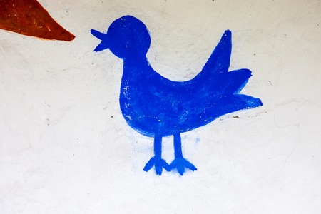 Traditional Ukrainian folk art painting on the wall of the houseの写真素材