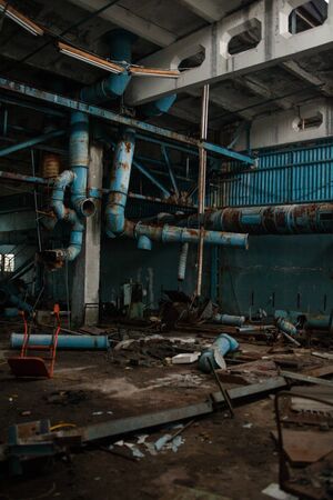 Inside the old ruined and abandoned industrial plantの写真素材