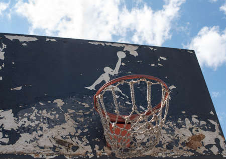 KYIV, UKRAINE -  JUNE 17, 2014: Partly damaged Jumpman logo by Nike painted on the black backboard of the old basketball court in Kyiv.のeditorial素材