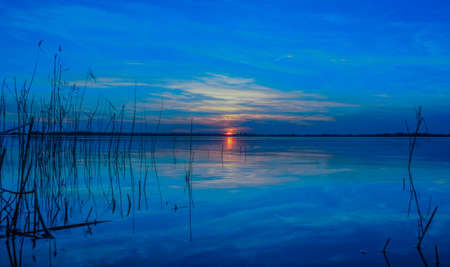 Blue sunset at the lakeの写真素材
