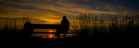 Silhouette and sunsetの写真素材
