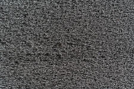 closed up grey plastic fiber carpet background texturesの写真素材