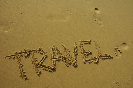travel written in the sandの写真素材