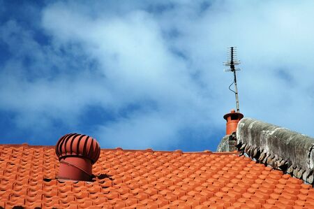 detail photo of typical australian house roof, orange tilesの写真素材