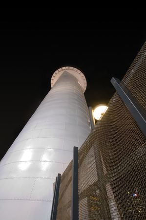in reality it's just a lighthouse, but it looks like a guards tower in a prison to meの写真素材