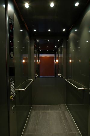 open stainless elevetaor with mirror, i had to erase myself ...