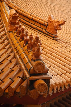 orange roof detail with sculptures, biggest buddhist temple in southern hemisphere,の写真素材