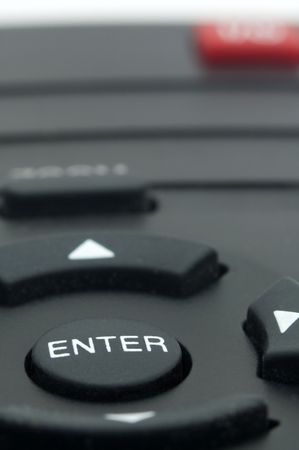 detail photo of remote controller with only ENTER button in focusの写真素材