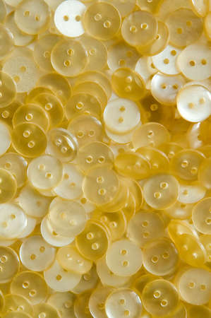 yellow small buttons background,の写真素材