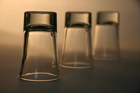 three empty alcohol glasses, distance blurの写真素材