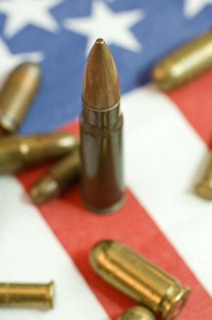 several bullets on USA flag, shallow depth of view