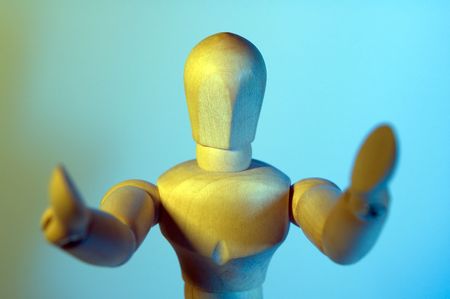 wooden male figure spreading his hands for a hug or a greeting, cyan backgroundの写真素材