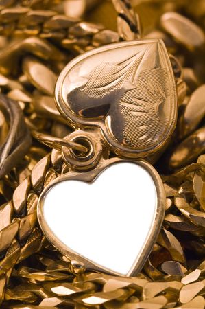 opened small golden jewelery heartの写真素材