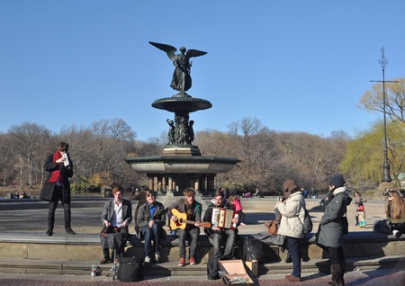 26. MARCH 2011 - NEW YORK CITY, USA - young music band performing at Bethesda Fountain in Central Park, Manhattan, New York City, USA. Photo taken on 26. March 2011.のeditorial素材