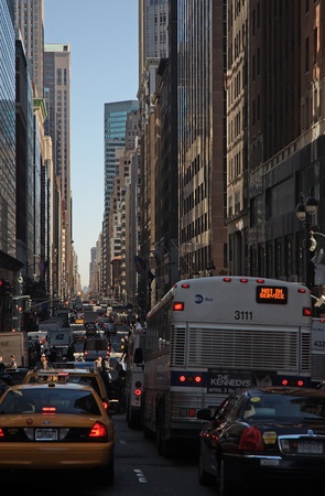 28. MARCH 2011 - MANHATTAN, NEW YORK CITY, USA - cars and bus traffic jam in the streets of New York City. Photo taken on 28. march 2011.のeditorial素材