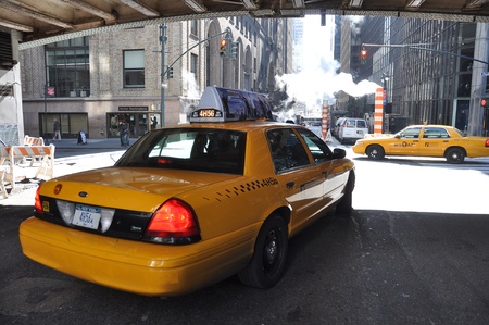 28. MARCH 2011 - NEW YORK, USA - yellow taxis near Grand Central Terminal in New York, USA. Photo taken on 28 march 2011.のeditorial素材