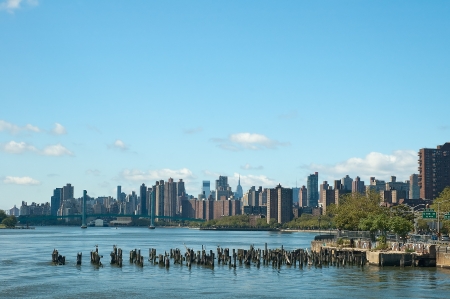 Old Pillars in the Hudson River, Midtown Manhattan and Harlem in background