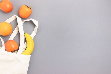Canvas bag with fruit. Zero waste concept with place for your text.