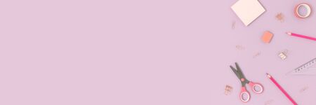 Top view of various stationery on a purple pastel background. Back to school concept banner with...