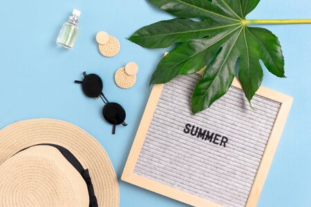 Vacation flat lay composition. Women's accessories, felt letterboard with word Summer.の写真素材