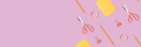 Pattern made of stationery on a purple pastel background. School banner concept.
