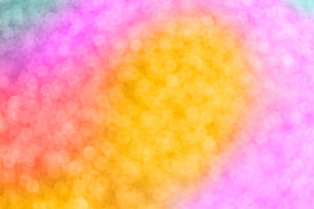 Golden and pink shiny defocused background. Holidays concept.