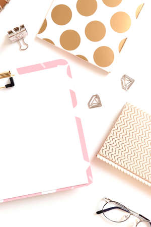 Composition with clipboard and stationery on the white table